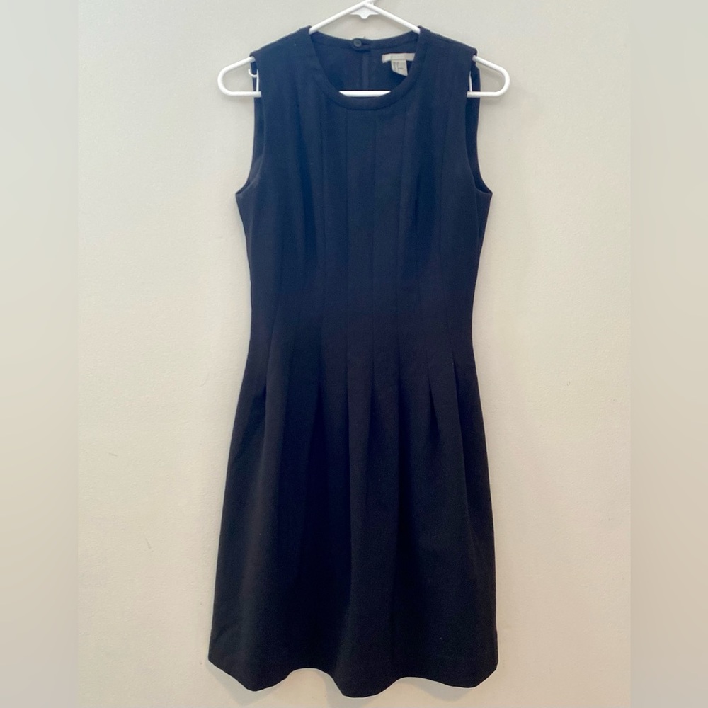 Black pleated sheath dress, 8